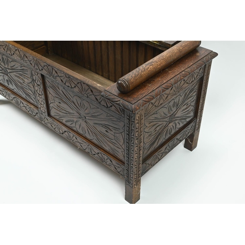 383 - Small carved front oak coffer. W104cm D49cm H52cm