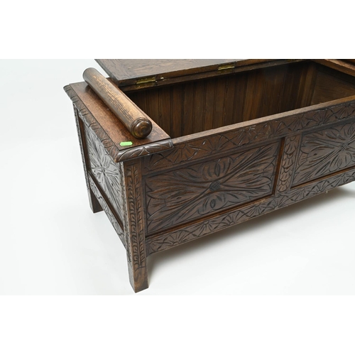 383 - Small carved front oak coffer. W104cm D49cm H52cm