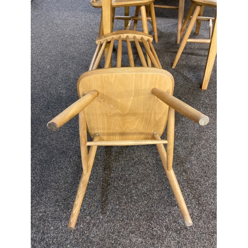 568 - Modern beech table with two small folding leaves and four Ercol style chairs. Table W97 D77 H74cm