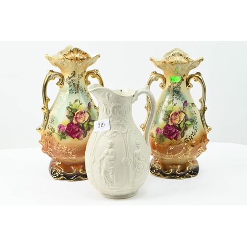 319 - Pair of gilt and floral decorated twin handled vases together with one other pitcher with '18 W B In... 