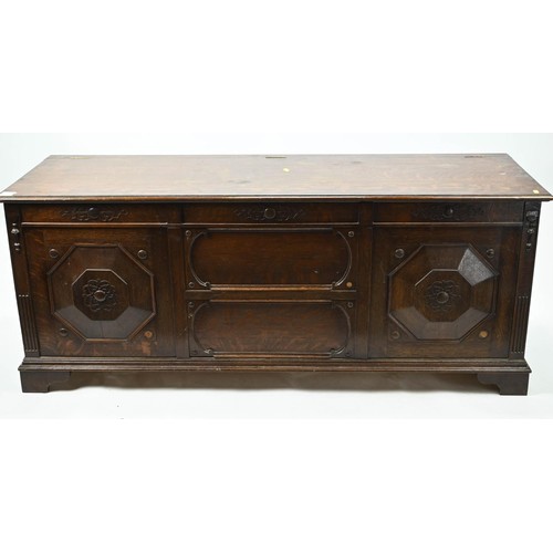 354 - Large panel fronted coffer. W152cm D50cm H61cm