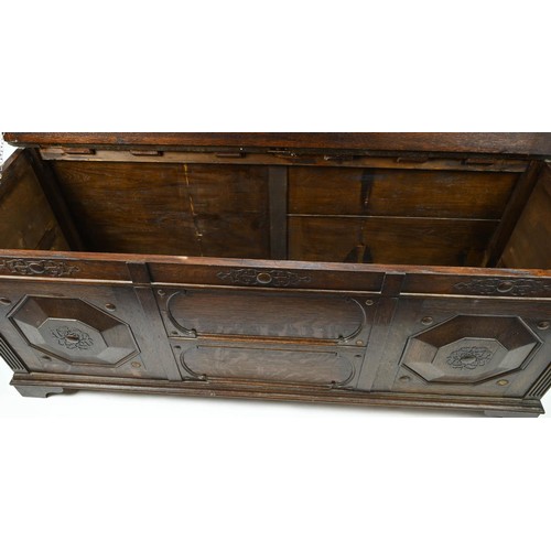 354 - Large panel fronted coffer. W152cm D50cm H61cm