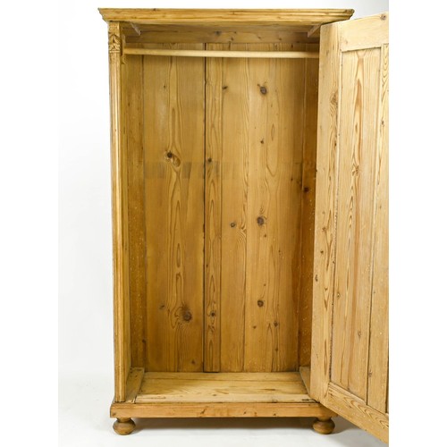 366 - Stripped pine wardrobe / cupboard with carved detail. W100 x 52 x H178cm