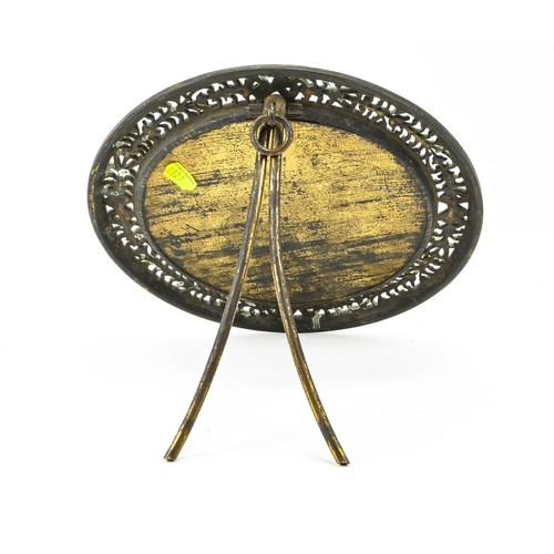 371 - Circular brass framed bevelled mirror. Diameter of 24.5cm