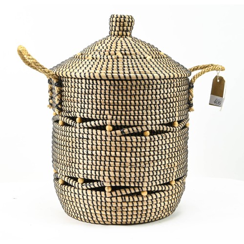 406 - Twin handled sea grass lidded basket. Diameter 31cm