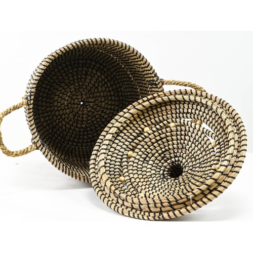 406 - Twin handled sea grass lidded basket. Diameter 31cm