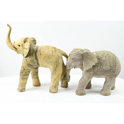 413 - Two decorative elephants. Tallest to trunk 36cm.