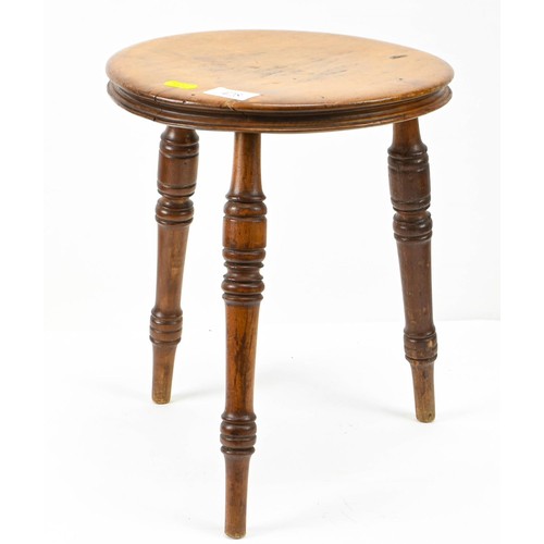 428 - Mahogany milking stool, 34.5cm high.