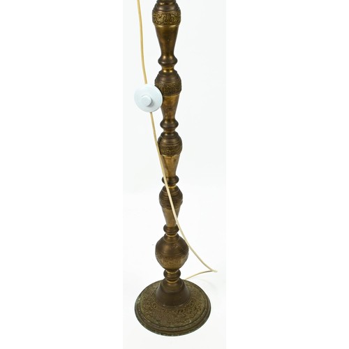 432 - Brass standard lamp base with Asian design. Height to fitting 140cm