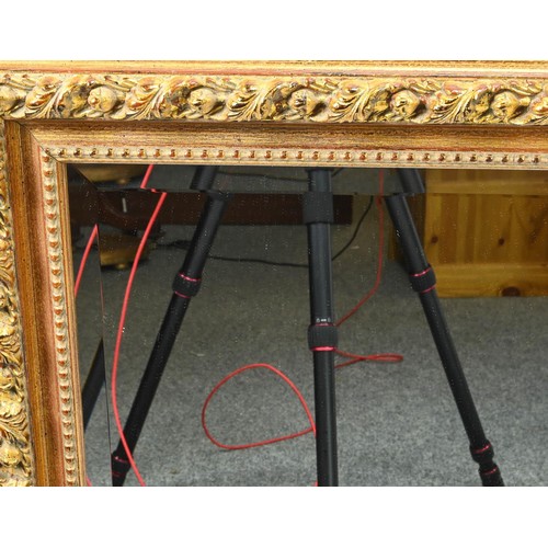 436 - Bevelled gilt framed mirror. W104 x H105cm