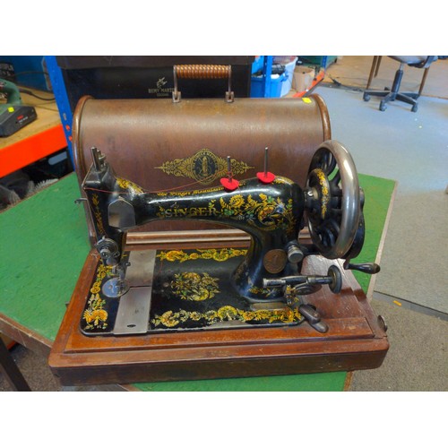 145 - Singer sewing machine in wooden case