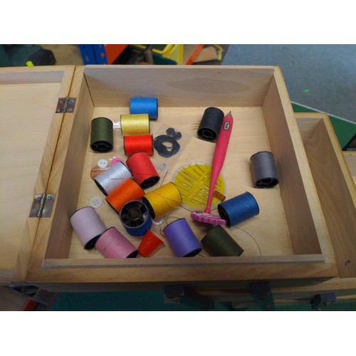 148 - Sewing box with small amount of threads 