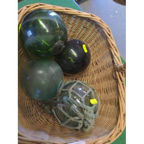 197 - 4 x glass fishing Buoys/floats in wicker basket 