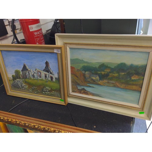 286 - Two framed oil paintings on board of landscapes, one signed  P. Wooley