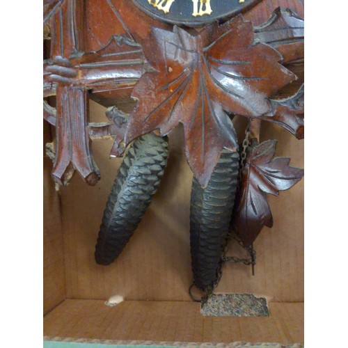 567 - Black forest style cookoo clock with weights