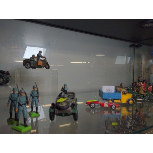 593 - Shelf of mixed toy soldiers, military vehicles inc, Brittans etc 