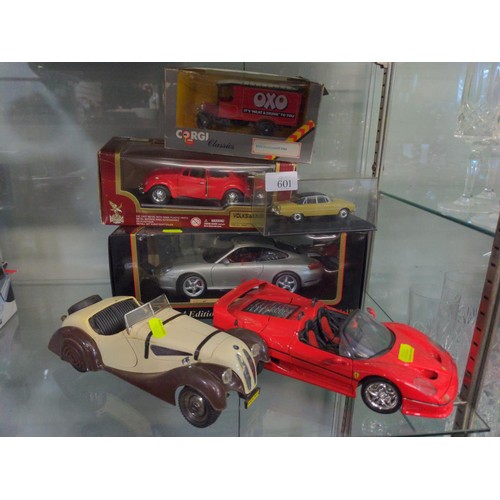 601 - Boxed and loose scale models, die cast Corgi and Maisto.