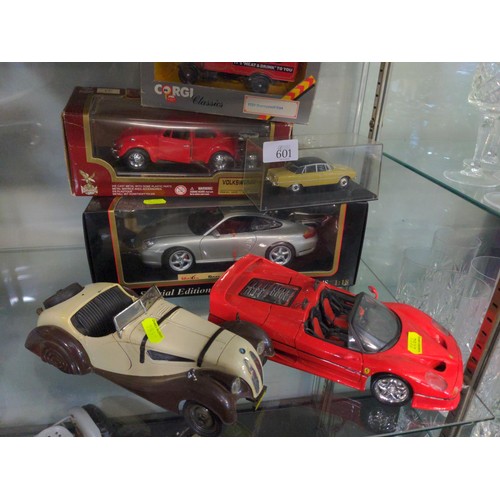 601 - Boxed and loose scale models, die cast Corgi and Maisto.