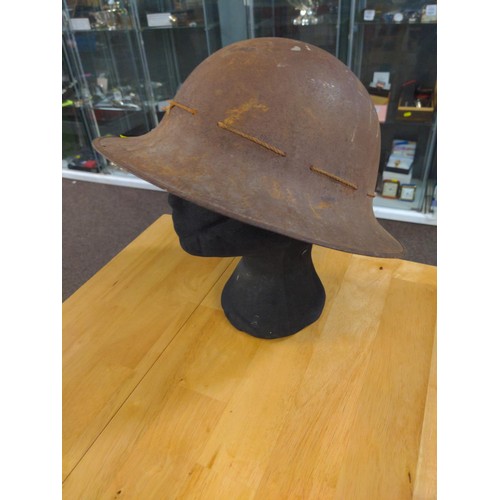 605 - British Fany helmet from WW2, 1941. With straps and lining . size 7 1/2