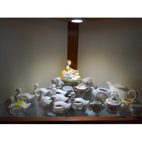 618 - Shelf of ceramic napkin rings, miniature plates/cups etc., plus others