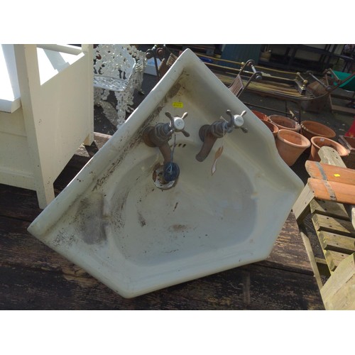 93 - Small corner sink with vintage brass taps 