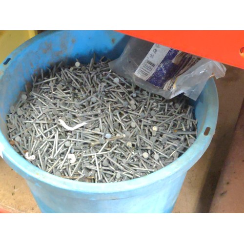 98 - Blue bucket containing galvanised nails