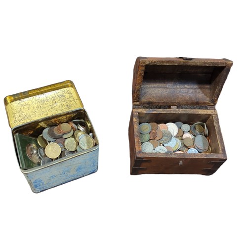 741 - Wooden box bound with metal and tin containing mixed coins, including some Guernsey commemorative, g... 