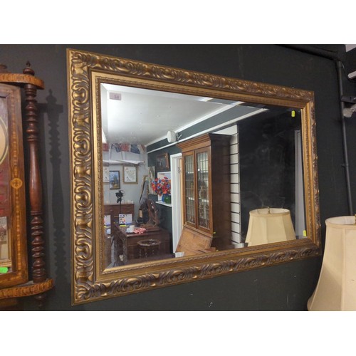 341 - Large bevelled gilt framed mirror. 110 x 78cm