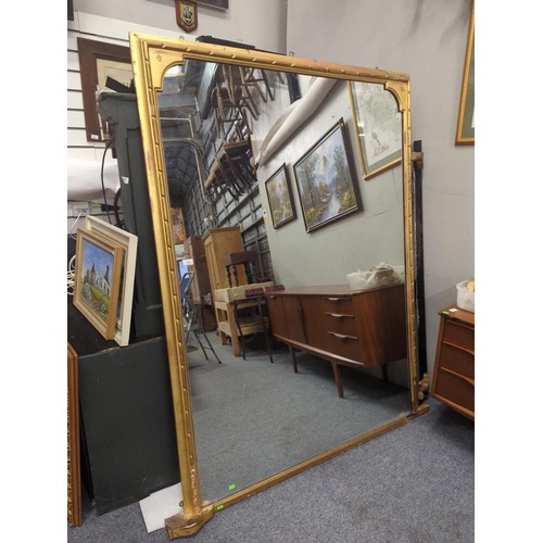 358 - Very large gilt framed mirror with some silvering. 185cm x 152cm