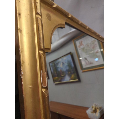 358 - Very large gilt framed mirror with some silvering. 185cm x 152cm