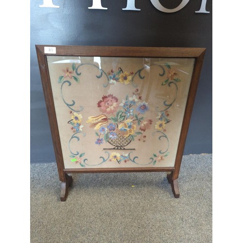 377 - Oak framed tapestry fire screen. 59cm wide.