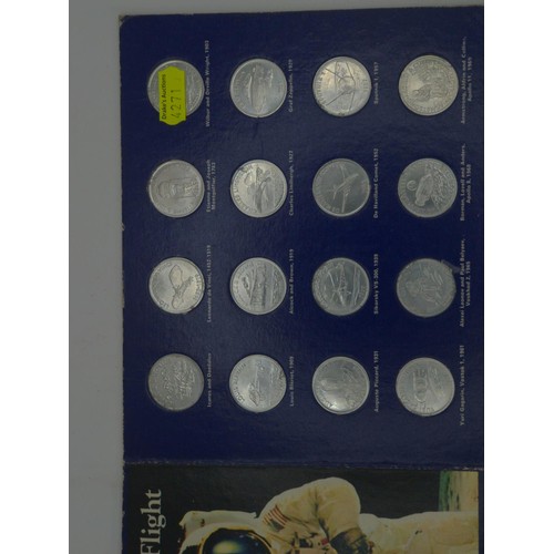 716 - Two Shell commemorative coin sets, including 'Historic Cars' and 'Man in Flight' , together wit... 