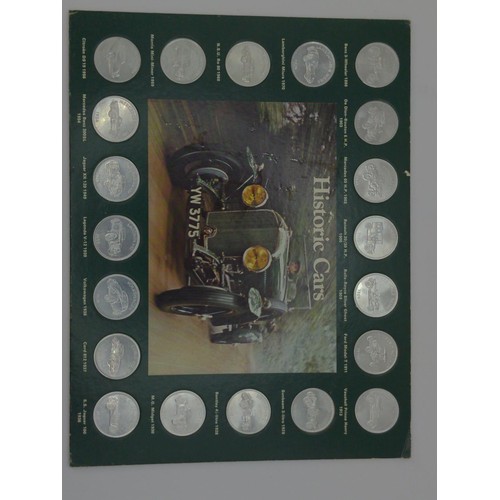 716 - Two Shell commemorative coin sets, including 'Historic Cars' and 'Man in Flight' , together wit... 