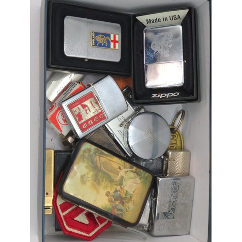 717 - Box of collectables Inc. lighters etc.