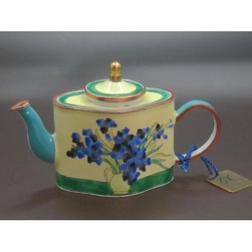 596 - Charlotte Di Vitta ltd ed, enamel tea pot with booklet and box.