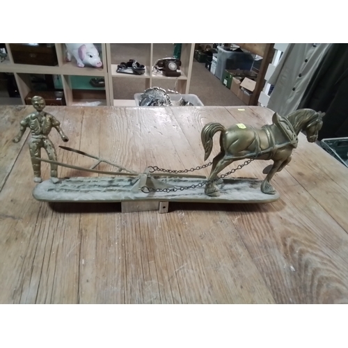 167 - Brass horse, plough and horseman. Length 51cm