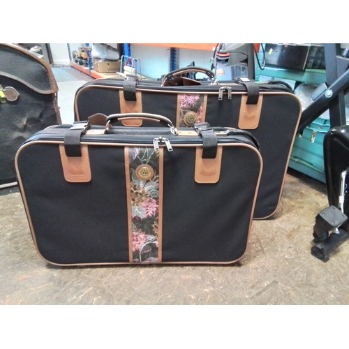 1352 - Two travel suitcases Carlton International. Largest 78 x 54cm smaller 68 x 44 cm