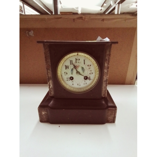 189 - Victoriana slate encased mantle clock with ornate trim and enamled face. H22.5 cm