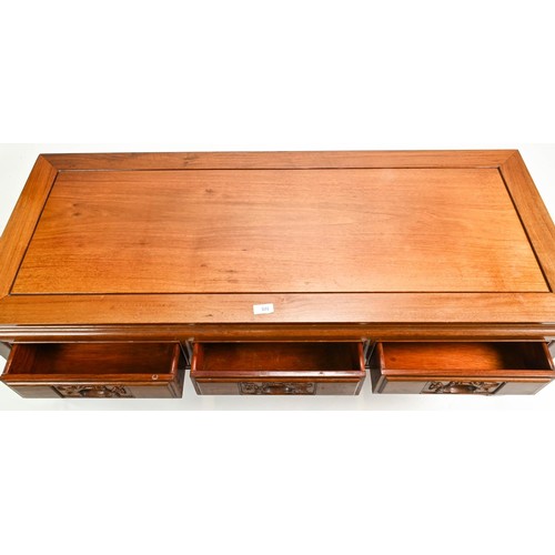 101 - Mahogany coffee table with three drawers L122 x D50 x H41cm