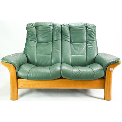 77 - Ekornes stressless reclining 2 seater sofa in green  148 width, 71cm depth,  101cm height,