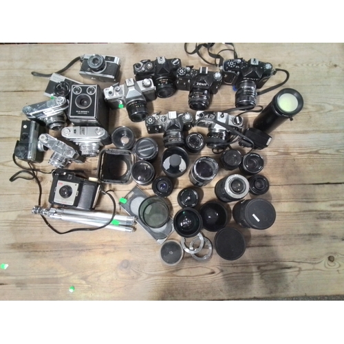 1307 - Variety of vintage manual cameras Inc, 35mm SLR 's, Viewfinders and instant plus lenses, filters, ex... 