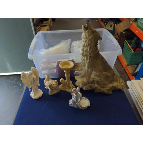 1218 - Box of different items inc. large resin wolf, Cherub, sunglasses, candles etc.