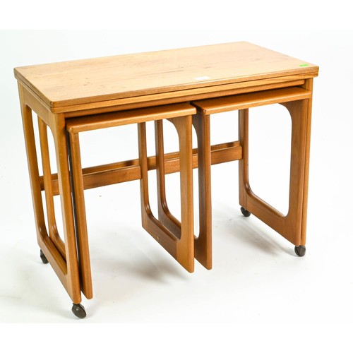 102 - McIntosh teak set of three nesting tables on casters with 74.5 x 81cm (unextended 74 x 40cm)