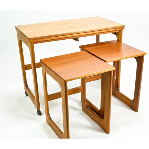 102 - McIntosh teak set of three nesting tables on casters with 74.5 x 81cm (unextended 74 x 40cm)