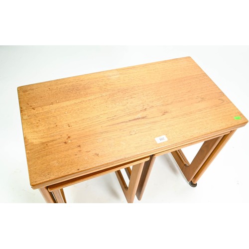 102 - McIntosh teak set of three nesting tables on casters with 74.5 x 81cm (unextended 74 x 40cm)