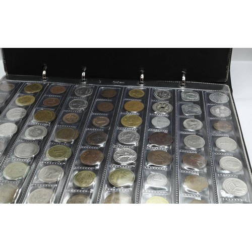 374 - Coin album of mixed world coins, gross weight including folder 3.28kg