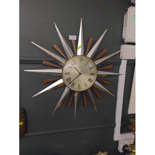 151 - Metamec quartz starburst clock Dia 59cm