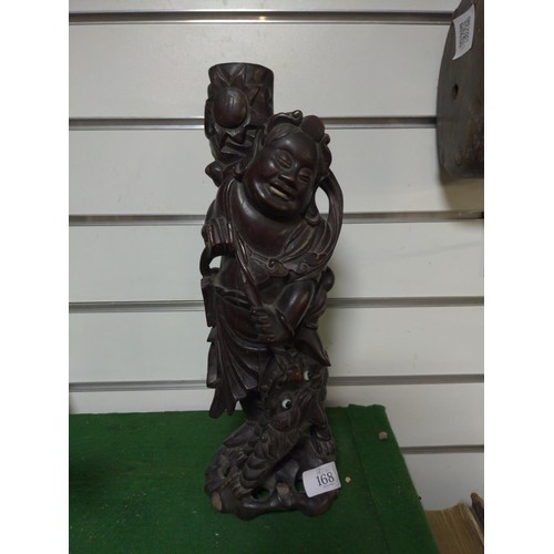 168 - Figural Asian lamp base depicting man with dog H35cm