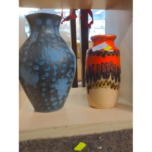 225 - Two West German vases: graphite and blue vase, height 26cm, marked M1245-25 to base, smaller vase ma... 