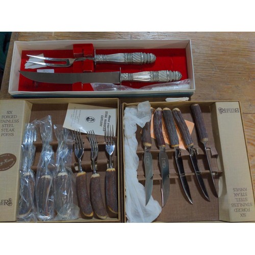 234 - Stag Horn steak knives and forks plus Pewter carving fork and knife.